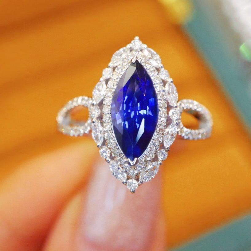 14k Gold 1.93 Ctw Natural Sapphire & Diamond Ring: Ref:230972354 // gold content:14k gold // ring size:7. 25us // // main gemstone:sapphire // shape:marquise // carat weight:1. 45ct // color:royal blue // treatment:natural // // adjacent gemstone