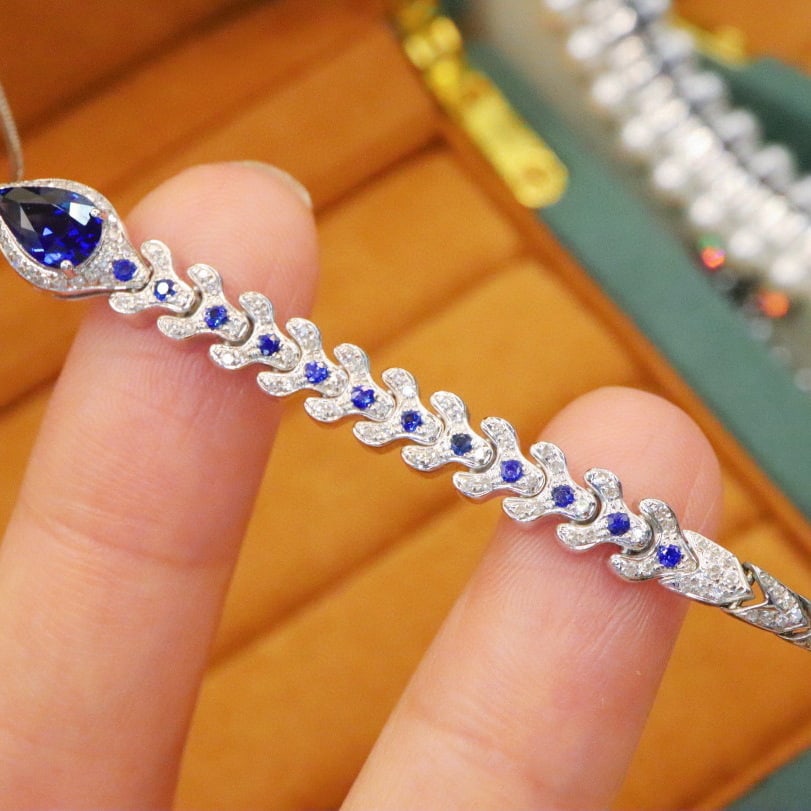 14k Gold 1.44 Ctw Natural Sapphire & Diamond Pendant( Without Chain ): Ref:230972356 // gold content:14k gold // main gemstone:sapphire // shape:pear // carat weight:1. 12ct // color:royal blue // treatment:natural // // adjacent gemstone 2 : diamond // number of