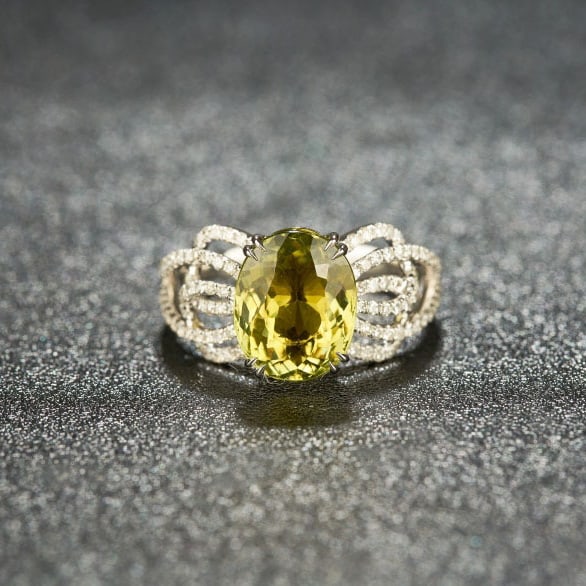 14k Gold 3.39 Ctw Natural Tourmaline & Diamond Ring: Ref:230972414 // gold content:14k gold // ring size:7. 25us // // main gemstone:tourmaline // shape:oval // carat weight:3. 16ct // color:yellow // treatment:natural // // adjacent gemstone 2 :