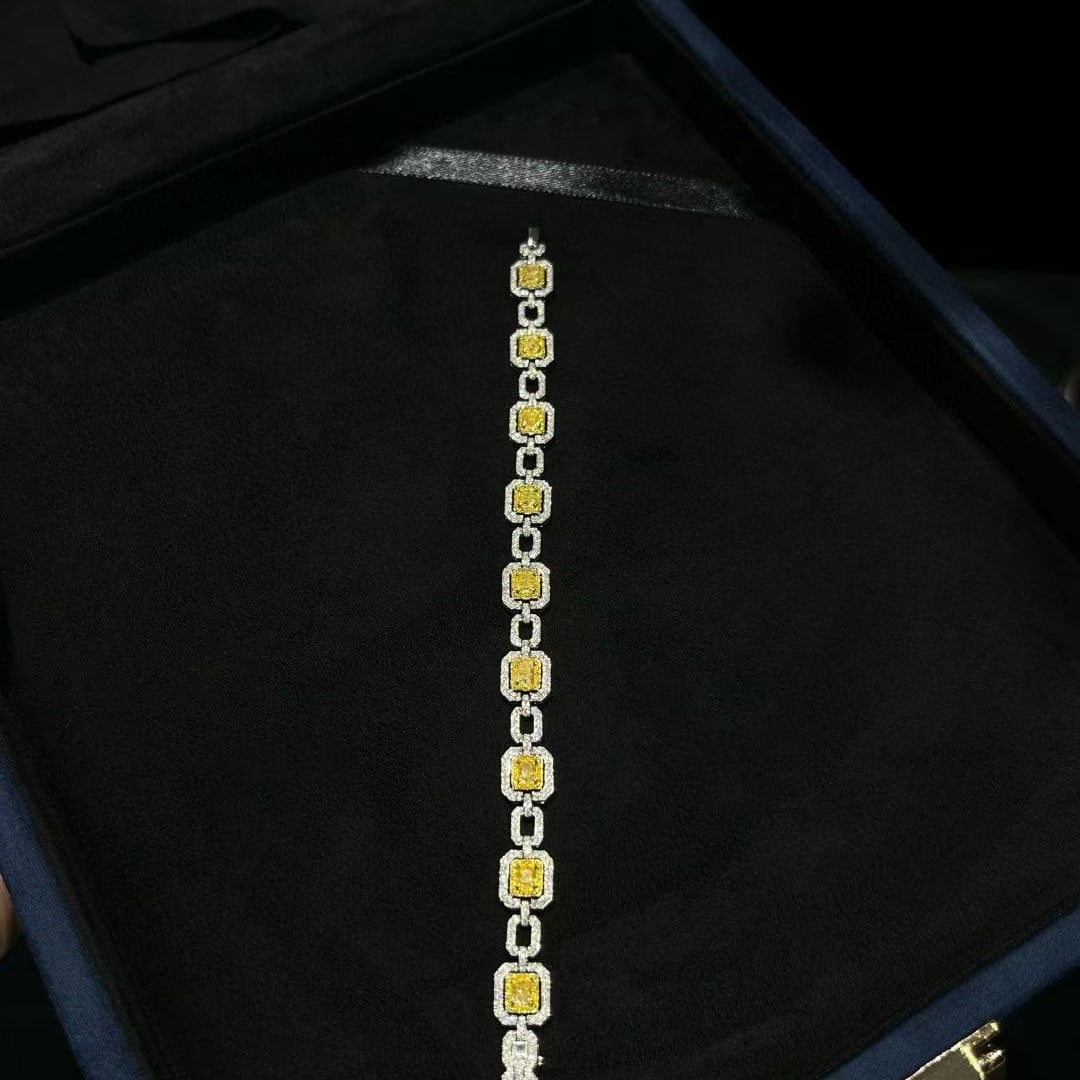 14k Gold 4.11 Ctw Natural Yellow Diamond & Diamond Bracelet: Ref:230972435 // gold content:14k gold // main gemstone:yellow diamond // shape:cushion // carat weight:2. 27ct // color:yellow // treatment:natural // // adjacent gemstone 2 : diamond // shape:round