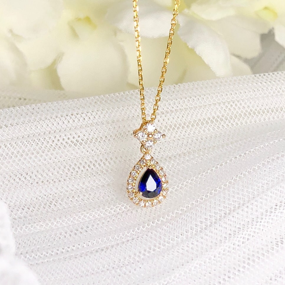 14k Gold 0.42 Ctw Vivid Blue Natural Sapphire & Diamond Pendant( Without Chain ): Ref:230973056 // gold content:14k gold // main gemstone:sapphire // shape:pear // carat weight:0. 29ct // color:vivid blue // treatment:natural // // adjacent gemstone 2 : diamond // shape:round //