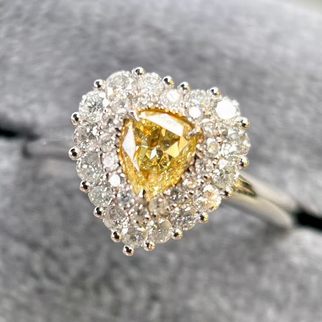 14k Gold 0.75 Ctw Natural Yellow Diamond & Diamond Ring: Ref:230973084 // gold content:14k gold // ring size:7. 25us // // main gemstone:yellow diamond // shape:pear // carat weight:0. 36ct // color:yellow // treatment:natural // // adjacent gemstone 2