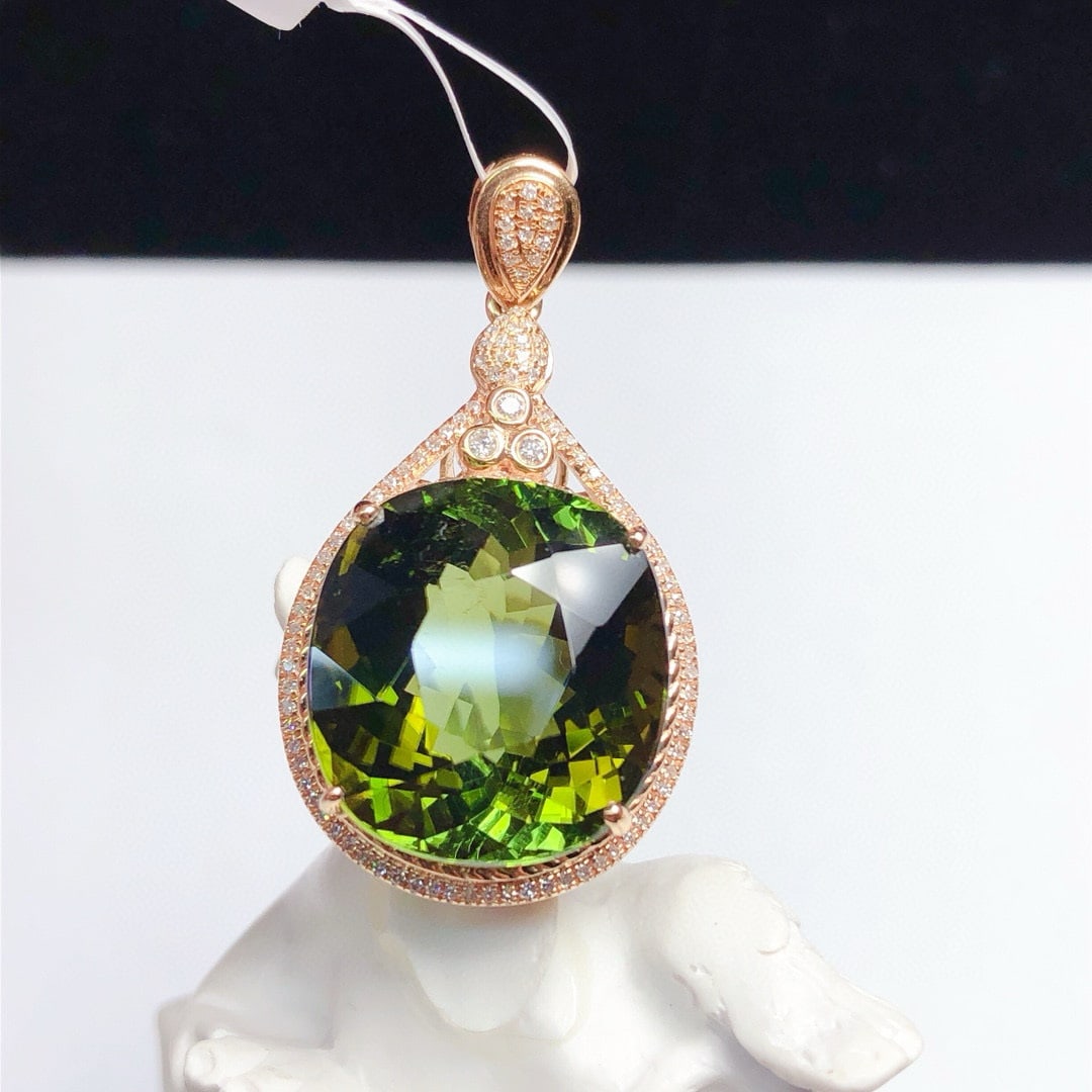 14k Gold 17.62 Ct Natural Tourmaline & Diamond Pendant( Without Chain ): Ref:230973101 // gold content:14k gold // main gemstone:tourmaline // shape:cushion // carat weight:17. 62ct // color:green // treatment:natural // // adjacent gemstone 2 : diamond // number of