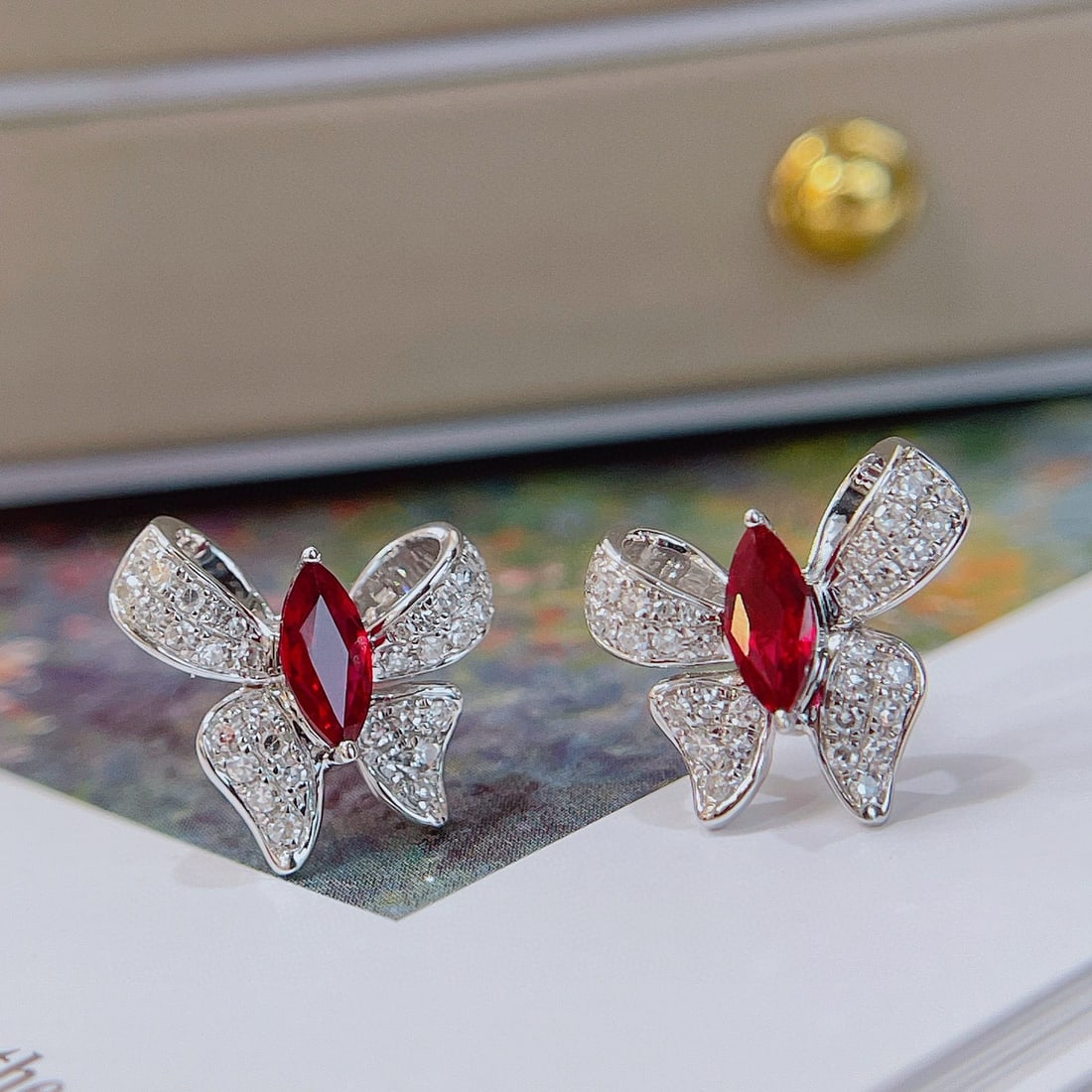 14k Gold 1.06 Ctw Natural Ruby & Diamond Earrings: Ref:230973104 // gold content:14k gold // main gemstone:ruby // shape:marquise // carat weight:0. 6ct // color:pigeonblood red // treatment:natural // // adjacent gemstone 2 : diamond //