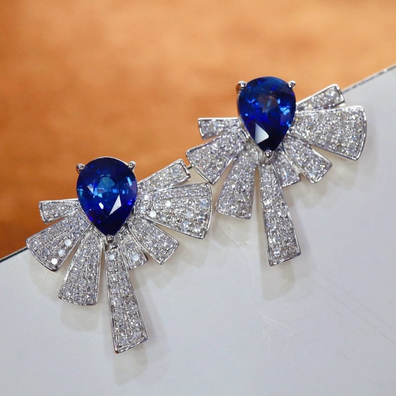 14k Gold 2.35 Ctw Natural Sapphire & Diamond Earrings: Ref:230973111 // gold content:14k gold // main gemstone:sapphire // shape:pear // carat weight:1. 85ct // color:royal blue // treatment:natural // // adjacent gemstone 2 : diamond // shape:round //