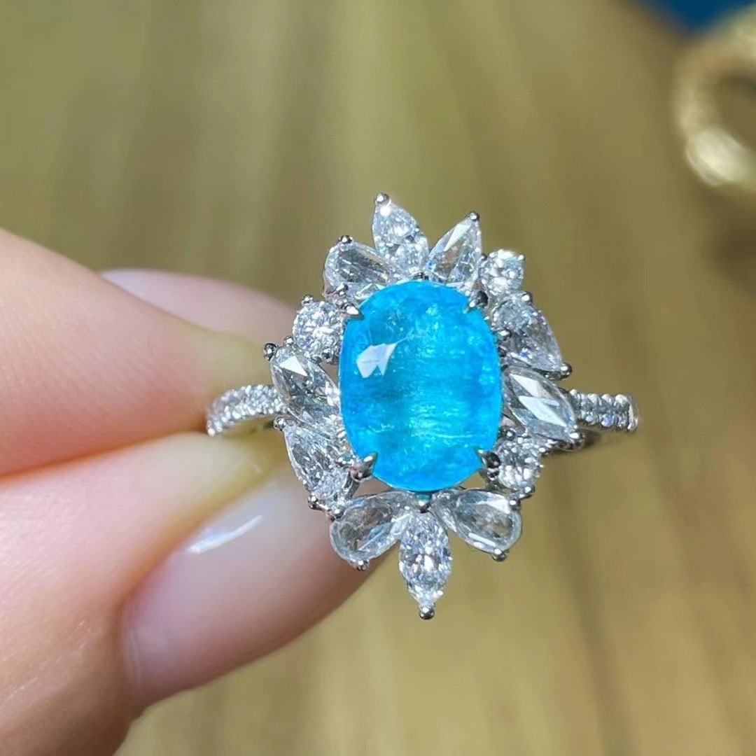14k Gold 1.62 Ct Natural Paraiba Tourmaline & Diamond Ring: Ref:230973156 // gold content:14k gold // ring size:7. 25us // // main gemstone:paraiba tourmaline // shape:oval // carat weight:1. 62ct // color:neon blue // treatment:natural // // adjacent gemstone