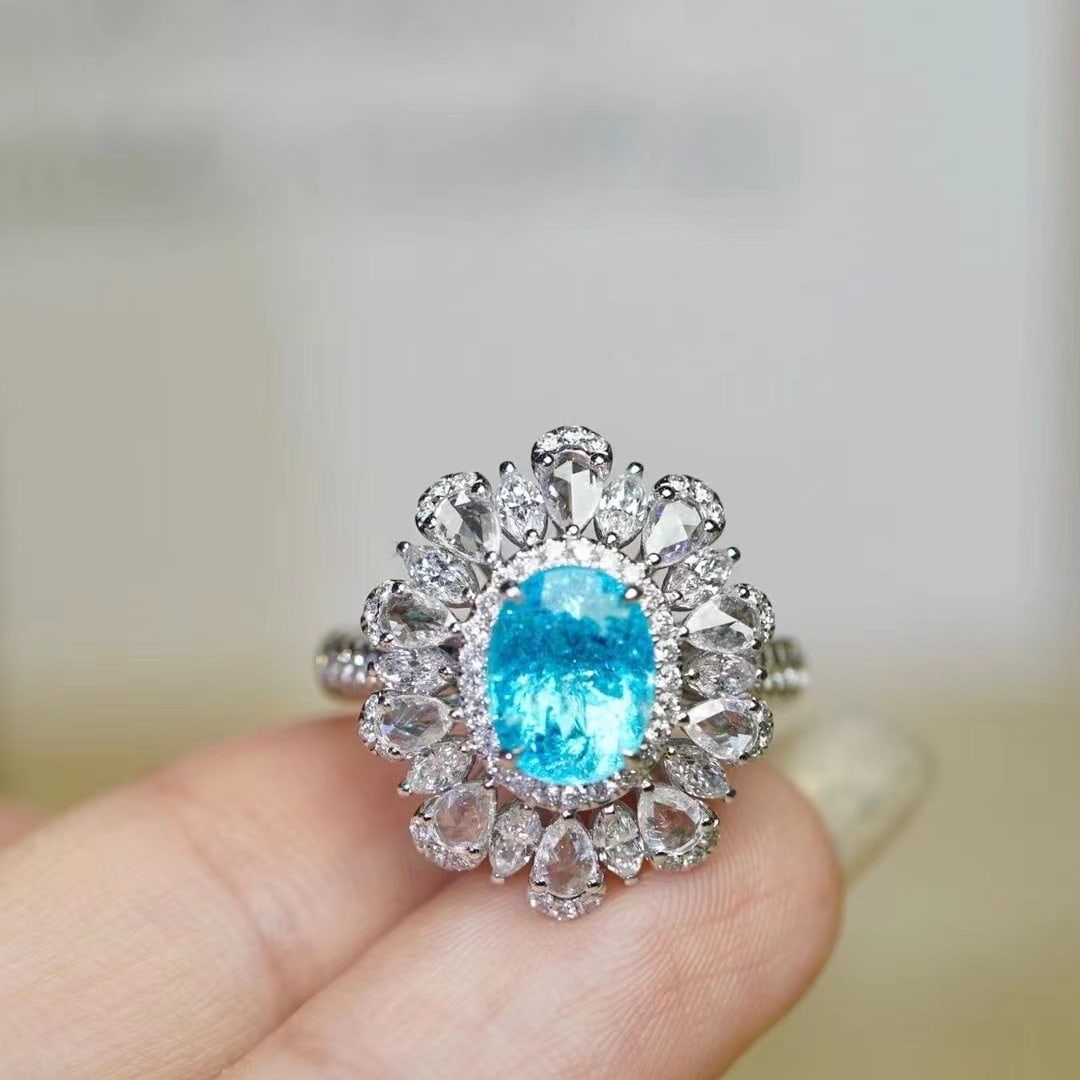 14k Gold 3.74 Ctw Natural Paraiba Tourmaline & Diamond Ring: Ref:230973171 // gold content:14k gold // ring size:7. 25us // // main gemstone:paraiba tourmaline // shape:oval // carat weight:2. 27ct // color:neon blue // treatment:natural // // adjacent gemstone