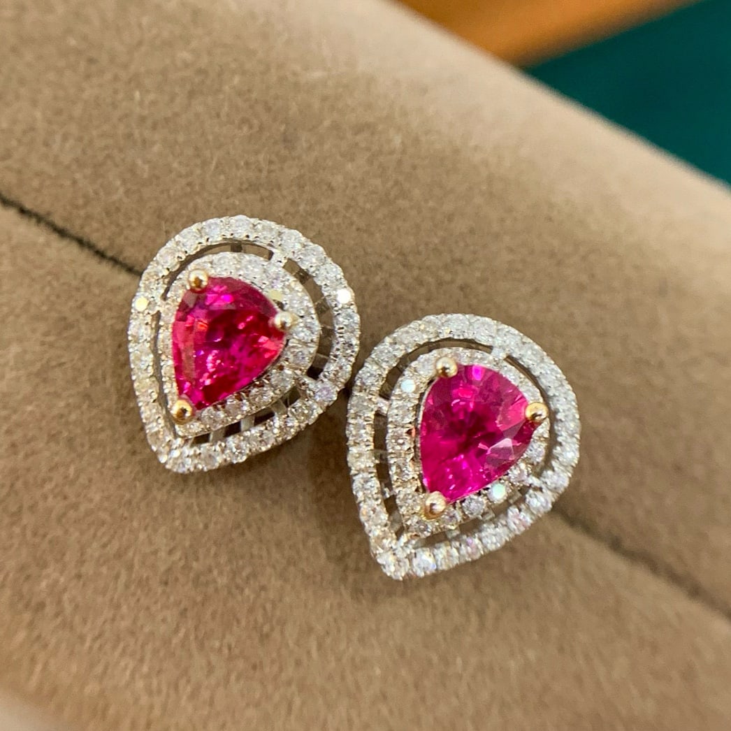 14k Gold 1.18 Ct Natural Ruby & Diamond Earrings: Ref:230973223 // gold content:14k gold // main gemstone:ruby // shape:pear // carat weight:1. 18ct // color:red // treatment:natural // // adjacent gemstone 2 : diamond // number of stones:86 //