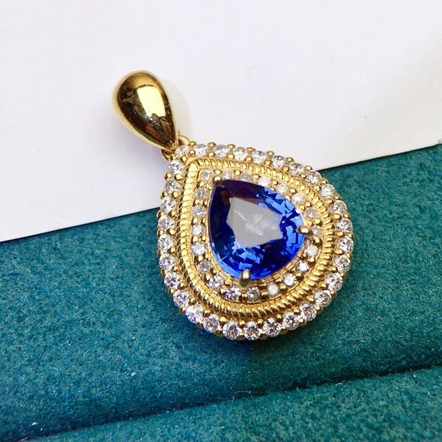 14k Gold 1.75 Ctw Natural Sapphire & Diamond Pendant( Without Chain ): Ref:230973241 // gold content:14k gold // main gemstone:sapphire // shape:pear // carat weight:1. 35ct // color:blue // treatment:natural // // adjacent gemstone 2 : diamond // shape:round // carat