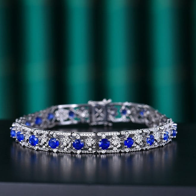 14k Gold 6.65 Ctw Natural Sapphire & Diamond Bracelet: Ref:230974007 // gold content:14k gold // main gemstone:sapphire // shape:round // carat weight:5. 4ct // color:royal blue // treatment:natural // cut grade:g // // adjacent gemstone 2 : diamond // nu