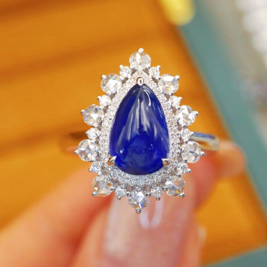 14k Gold 2.46 Ctw Natural Sapphire & Diamond Ring: Ref:230974028 // gold content:14k gold // ring size:7. 25us // // main gemstone:sapphire // shape:pear // carat weight:2. 01ct // color:royal blue // treatment:natural // // adjacent gemstone 2 :