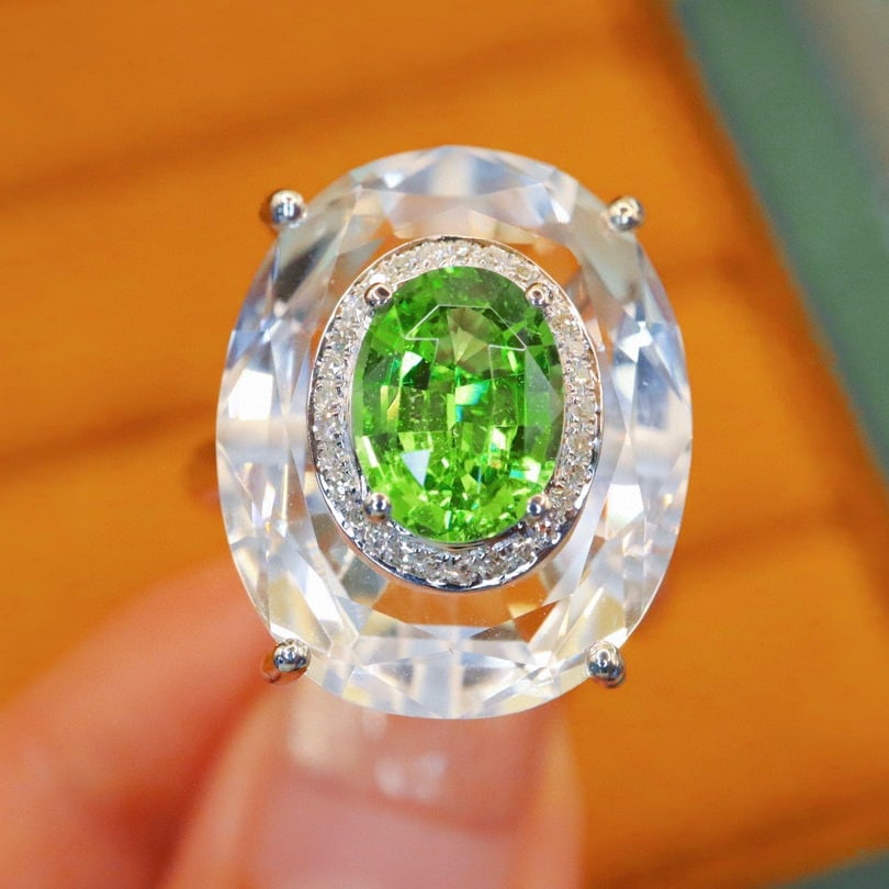 14k Gold 1.66 Ctw Natural Tsavorite & Diamond Ring: Ref:230974036 // gold content:14k gold // ring size:7. 25us // // main gemstone:tsavorite // shape:oval // carat weight:1. 58ct // color:green // treatment:natural // // adjacent gemstone 2 :