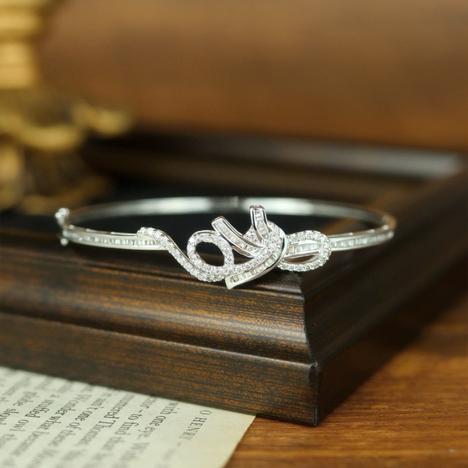 14k Gold 1.1 Ct Natural H Diamond Bangle: Ref:230974055 // gold content:14k gold // main gemstone:diamond // shape:multiply // carat weight:1. 1ct // clarity grade:vs-si // color:h // treatment:natural // Condition: NewLow Estimate: