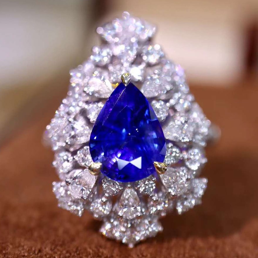 14k Gold 4.21 Ctw Natural Sapphire & Diamond Ring: Ref:230974072 // gold content:14k gold // ring size:7. 25us // // main gemstone:sapphire // shape:pear // carat weight:2. 55ct // color:blue // treatment:natural // // adjacent gemstone 2 :