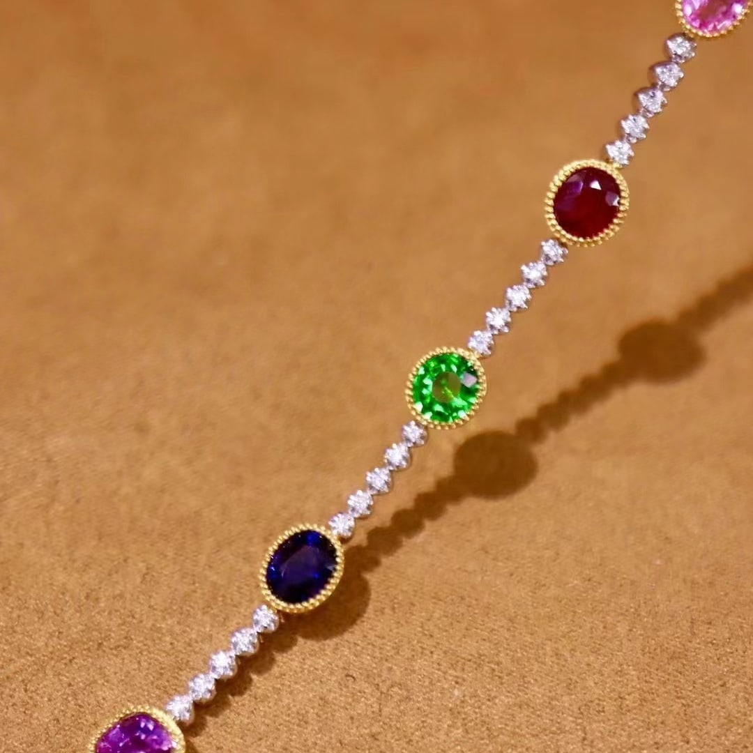 14k Gold 4.43 Ctw Natural Sapphire & Ruby & Tsavorite & Diamond Bracelet: Ref:230974124 // gold content:14k gold // main gemstone:sapphire & ruby & tsavorite // shape:oval // carat weight:4. 2ct // color:color // treatment:natural // // adjacent gemstone 2 : diamond //
