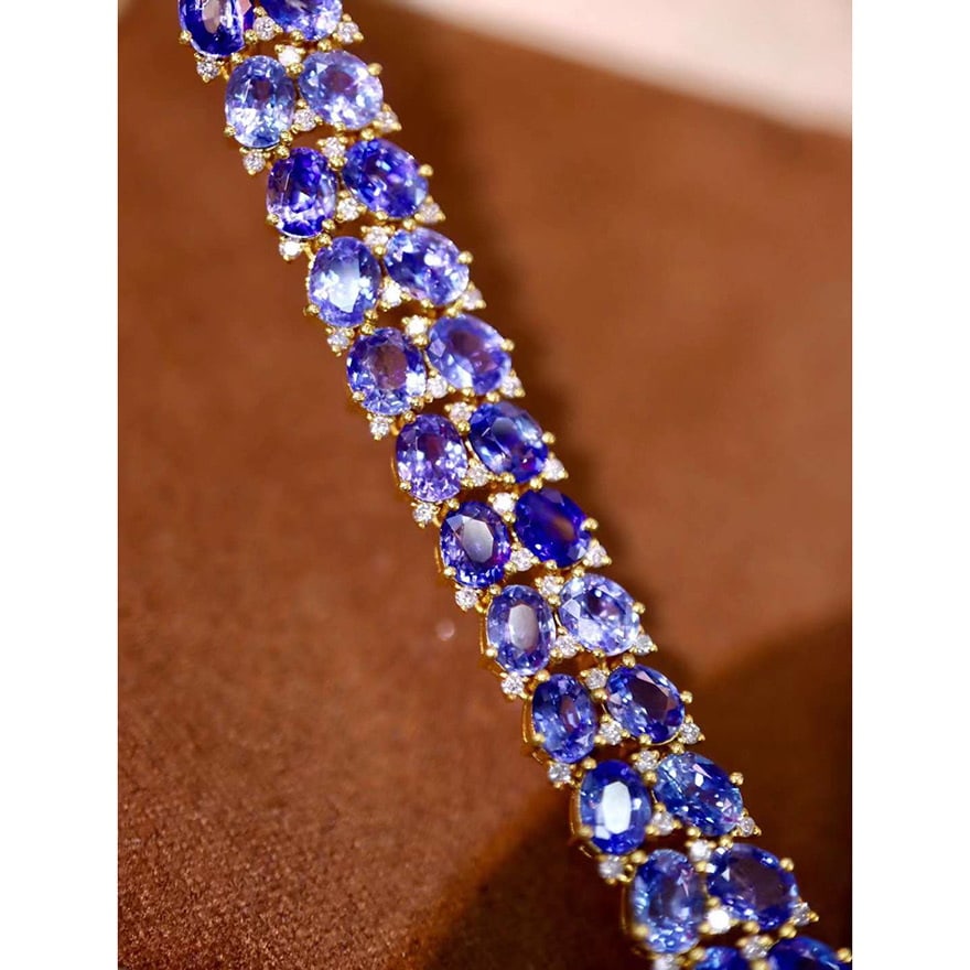 14k Gold 19.96 Ctw Natural Sapphire & Diamond Bracelet: Ref:230974157 // gold content:14k gold // main gemstone:sapphire // shape:oval // carat weight:19. 05ct // color:blue // treatment:natural // // adjacent gemstone 2 : diamond // shape:round // carat w