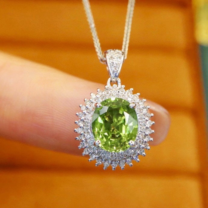 14k Gold 2.19 Ctw Natural Sapphire & Diamond Pendant( Without Chain ): Ref:230974201 // gold content:14k gold // main gemstone:sapphire // shape:oval // carat weight:1. 93ct // color:green // treatment:natural // // adjacent gemstone 2 : diamond // number of stones:67 //