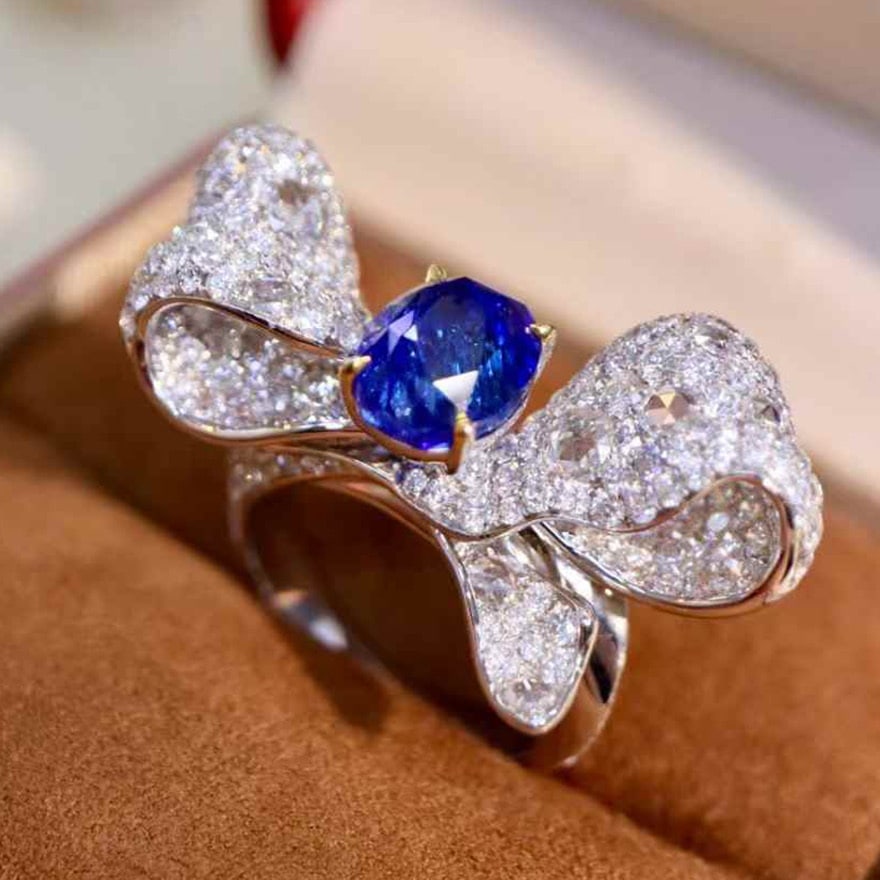 14k Gold 9.02 Ctw Natural Sapphire & Diamond Ring: Ref:230974222 // gold content:14k gold // ring size:7. 25us // // main gemstone:sapphire // shape:oval // carat weight:4. 63ct // color:blue // treatment:natural // // adjacent gemstone 2 :