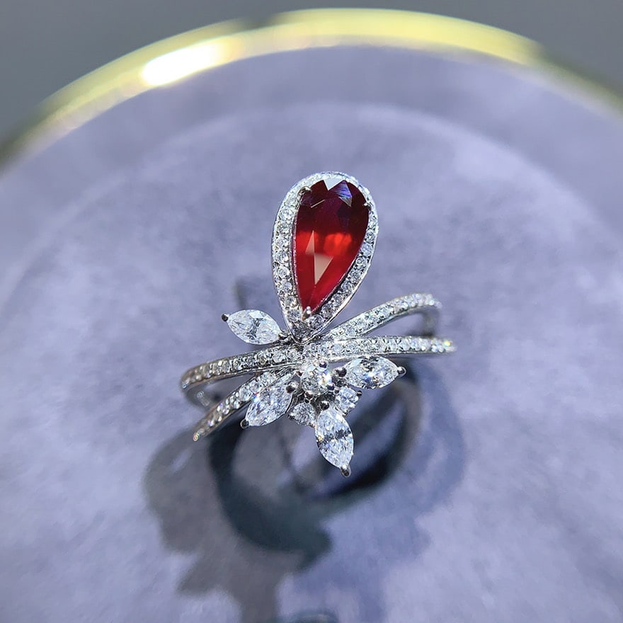 14k Gold 1.62 Ctw Natural Ruby & Diamond Ring: Ref:230974375 // gold content:14k gold // ring size:7. 25us // // main gemstone:ruby // shape:pear // carat weight:1. 06ct // color:pigeonblood red // treatment:natural // // adjacent gemstone 2 :