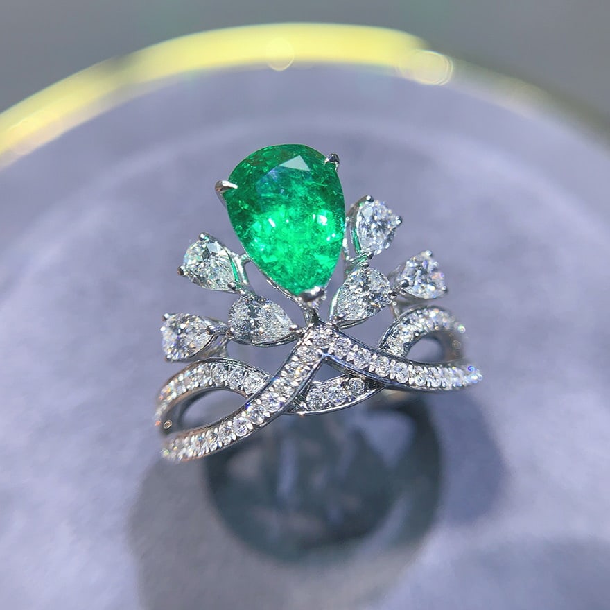 14k Gold 2.19 Ctw Natural Emerald & Diamond Ring: Ref:230974380 // gold content:14k gold // ring size:7. 25us // // main gemstone:emerald // shape:pear // carat weight:1. 31ct // color:green // treatment:natural // // adjacent gemstone 2 :
