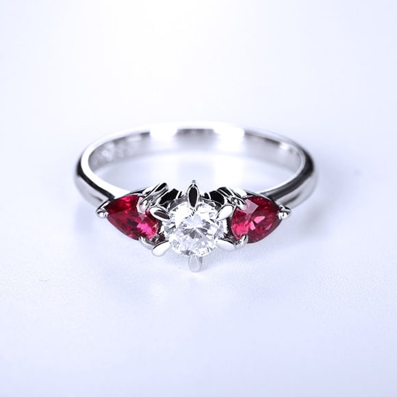 14k Gold 0.88 Ctw Natural Ruby & Diamond Ring: Ref:230974403 // gold content:14k gold // ring size:7. 25us // // main gemstone:ruby // shape:pear // carat weight:0. 3ct // color:red // treatment:natural // // adjacent gemstone 2 : diamond // shape