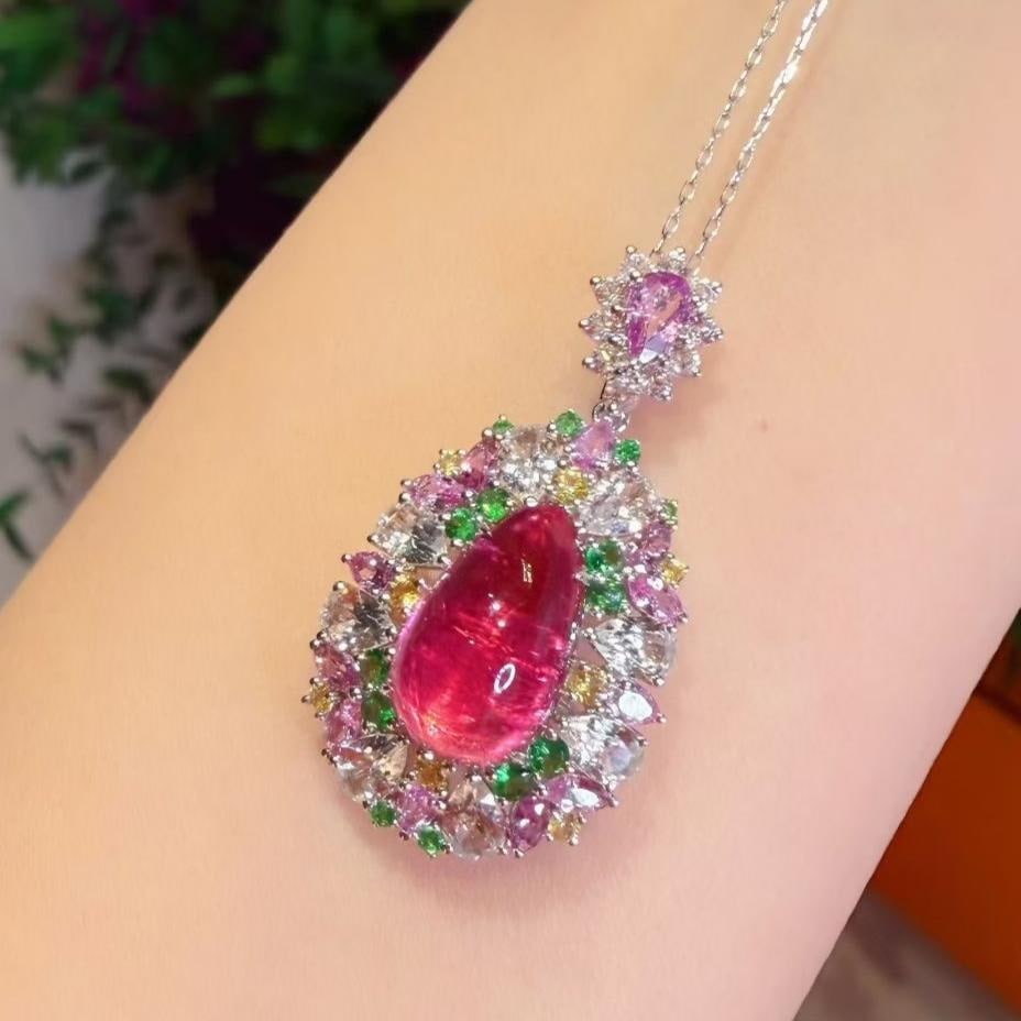 14k Gold 5.02 Ct Natural Tourmaline & Coloured Gemstone Pendant( Without Chain ): Ref:231131140 // gold content:14k gold // main gemstone:tourmaline // shape:pear // carat weight:5. 02ct // color:red // treatment:natural // // adjacent gemstone 2 : coloured gemstone //