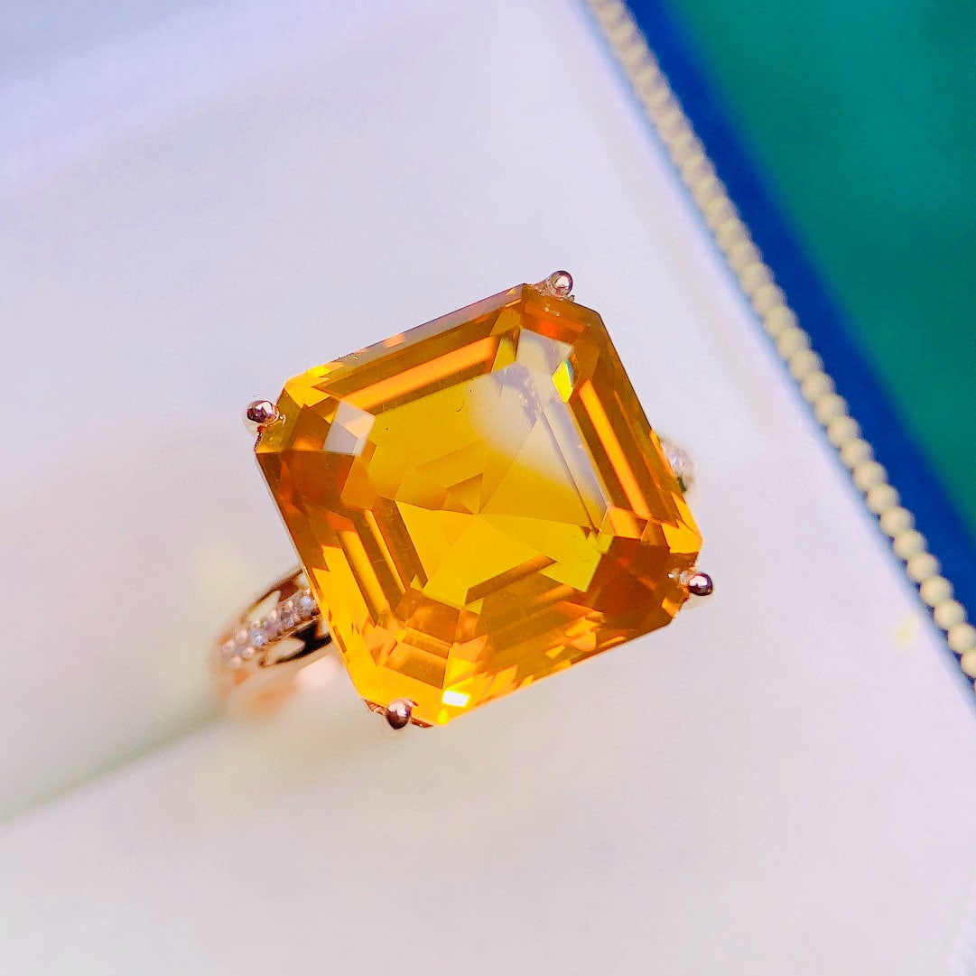 14k Gold 8.44 Ctw Natural Citrine & Diamond Ring: Ref:231131194 // gold content:14k gold // ring size:7. 25us // // main gemstone:citrine // shape:octagonal // carat weight:8. 4ct // color:yellow // treatment:natural // // adjacent gemstone 2 :