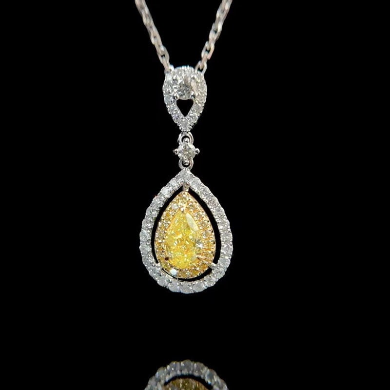 14k Gold 0.7 Ctw Natural Yellow Diamond & Diamond Pendant( Without Chain ): Ref:231131212 // gold content:14k gold // main gemstone:yellow diamond // shape:pear // carat weight:0. 4ct // color:yellow // treatment:natural // // adjacent gemstone 2 : diamond // shape:round // c
