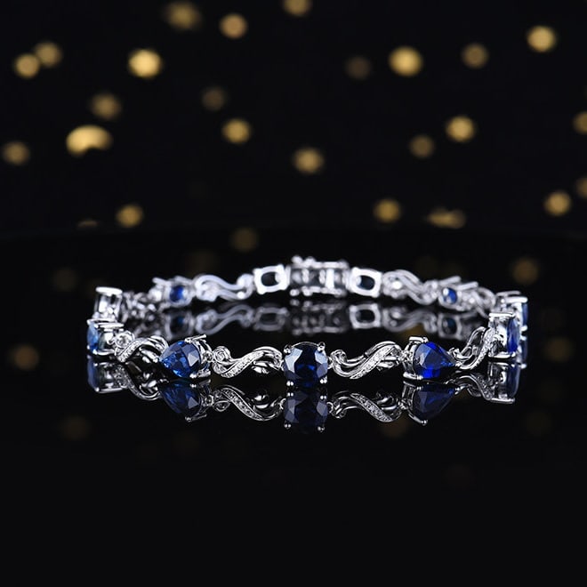 14k Gold 7.31 Ctw Natural Sapphire & Diamond Bracelet: Ref:231132015 // gold content:14k gold // main gemstone:sapphire // shape:multiple // carat weight:7. 18ct // color:blue // treatment:natural // // adjacent gemstone 2 : diamond // number of