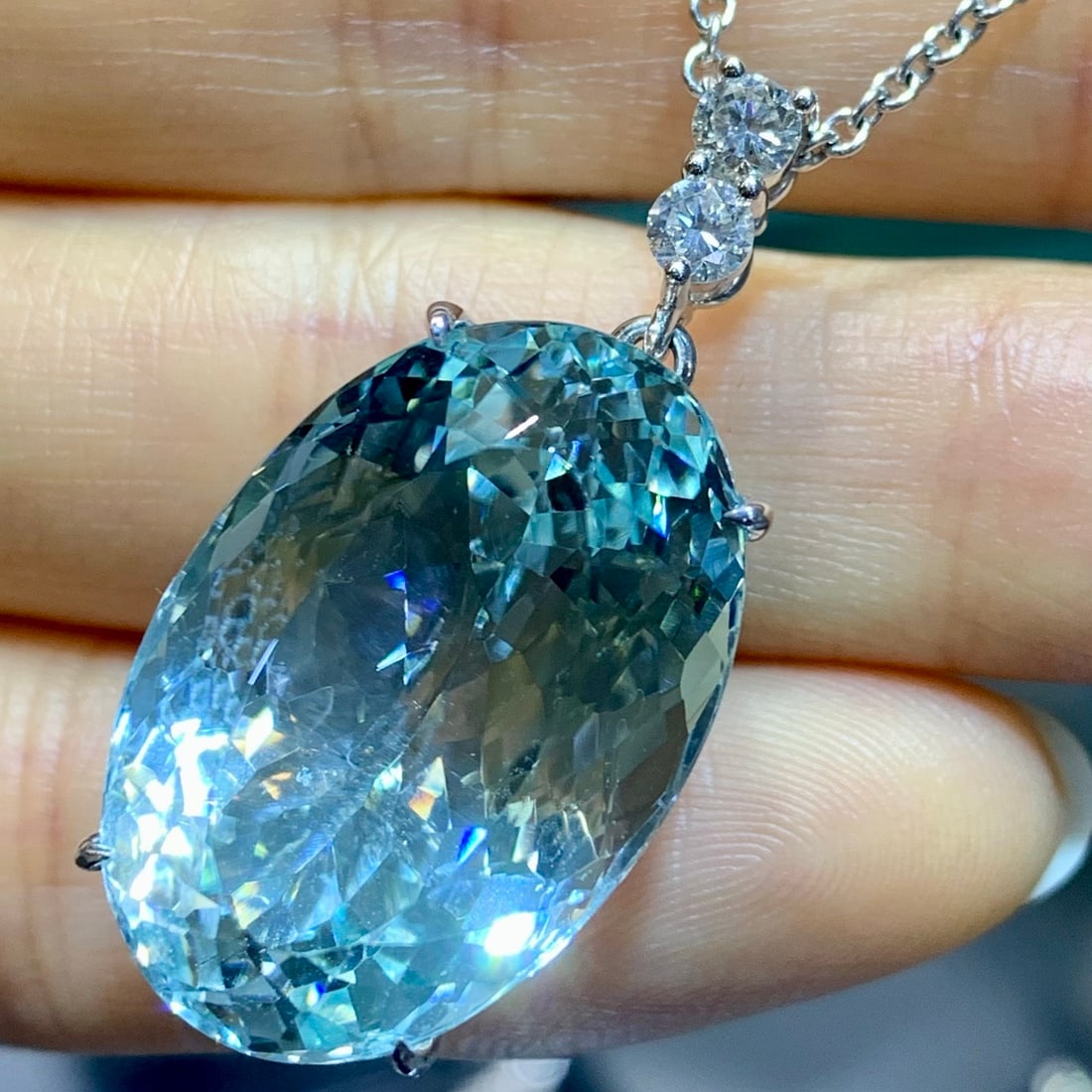 14k Gold 27.41 Ctw Natural Aquamarine & Diamond Pendant( Without Chain ): Ref:231132182 // gold content:14k gold // main gemstone:aquamarine // shape:oval // carat weight:27. 13ct // color:blue // treatment:natural // // adjacent gemstone 2 : diamond // shape:round //