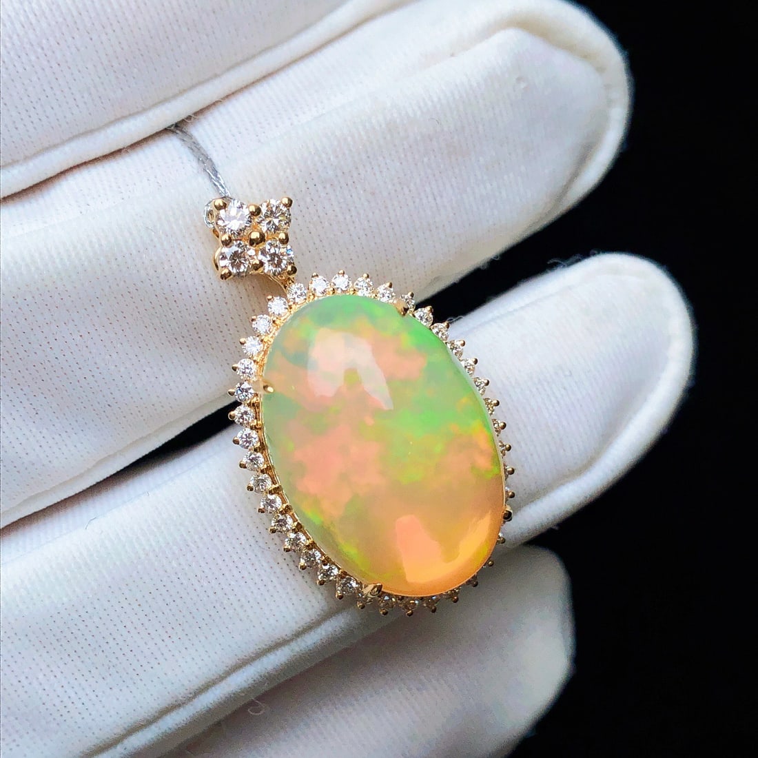 14k Gold 7.48 Ctw Natural Opal & Diamond Pendant( Without Chain ): Ref:231132224 // gold content:14k gold // main gemstone:opal // shape:oval // carat weight:7. 0ct // color:color // treatment:natural // // adjacent gemstone 2 : diamond // shape:round // carat
