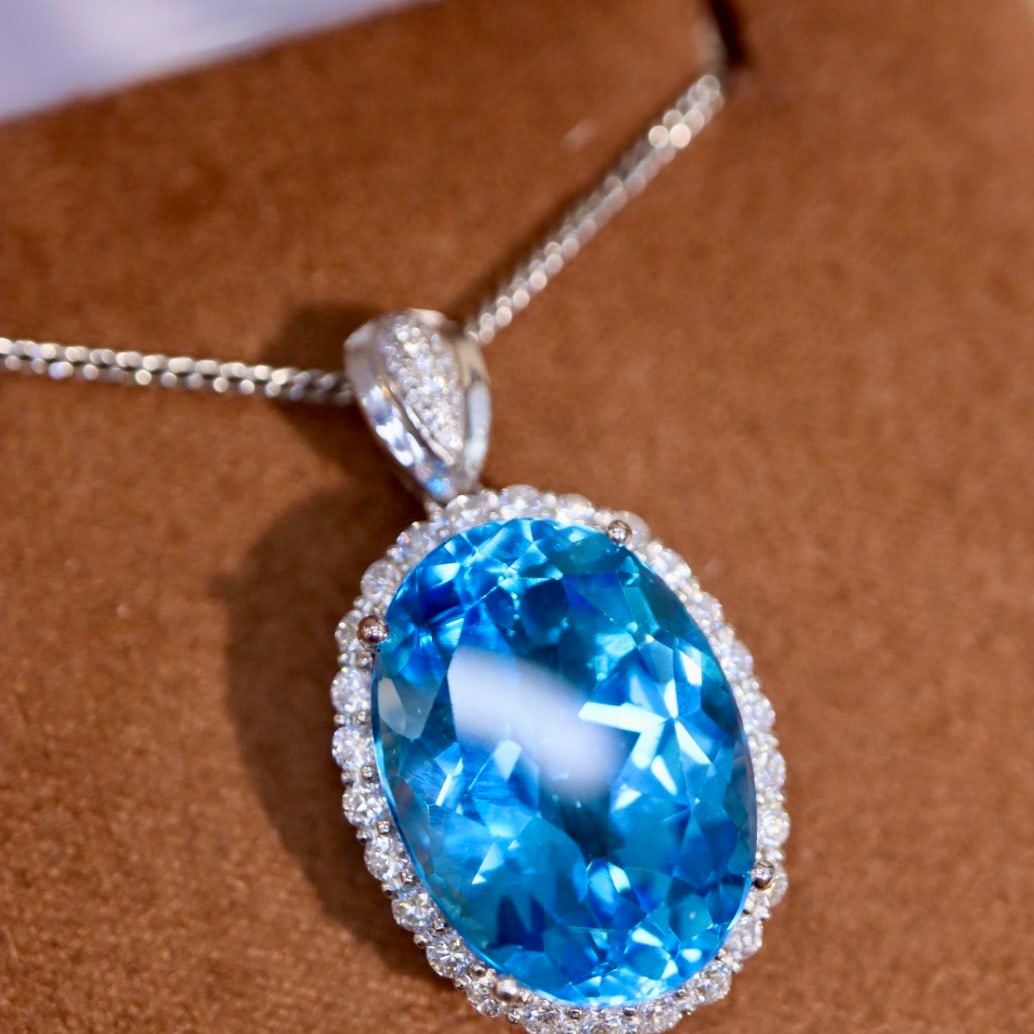14k Gold 15.88 Ctw Natural Topaz & Diamond Pendant( Without Chain ): Ref:231132307 // gold content:14k gold // main gemstone:topaz // shape:oval // carat weight:14. 9ct // color:blue // treatment:natural // // adjacent gemstone 2 : diamond // shape:round // carat