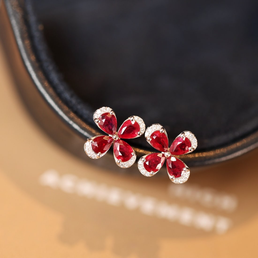 14k Gold 1.53 Ctw Natural Ruby & Diamond Earrings: Ref:231132340 // gold content:14k gold // main gemstone:ruby // shape:pear // carat weight:1. 45ct // color:red // treatment:natural // // adjacent gemstone 2 : diamond // shape:round // carat