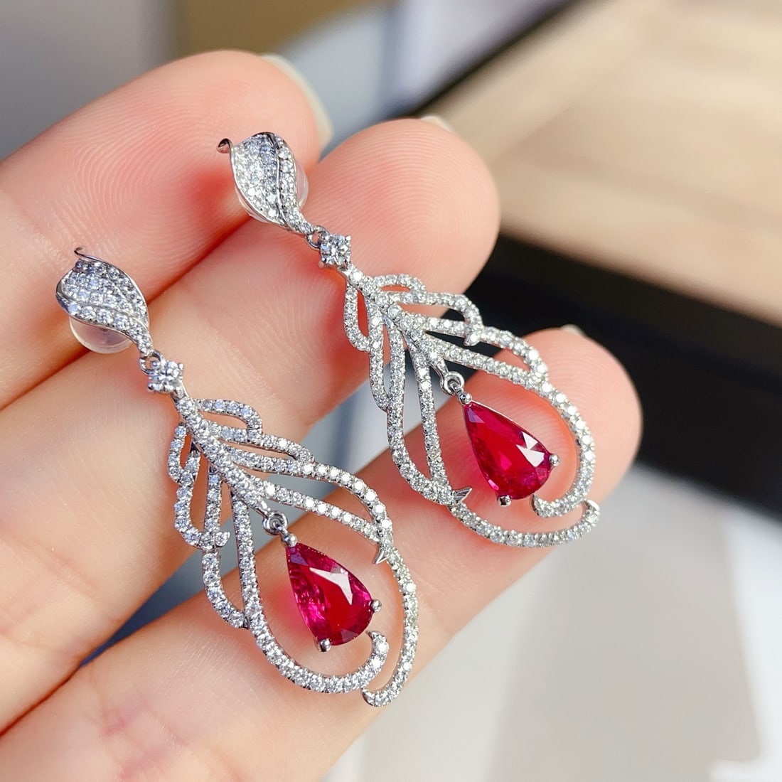 14k Gold 3.01 Ctw Natural Ruby & Diamond Earrings: Ref:231132378 // gold content:14k gold // main gemstone:ruby // shape:pear // carat weight:2. 05ct // color:red // treatment:natural // // adjacent gemstone 2 : diamond // shape:round // carat