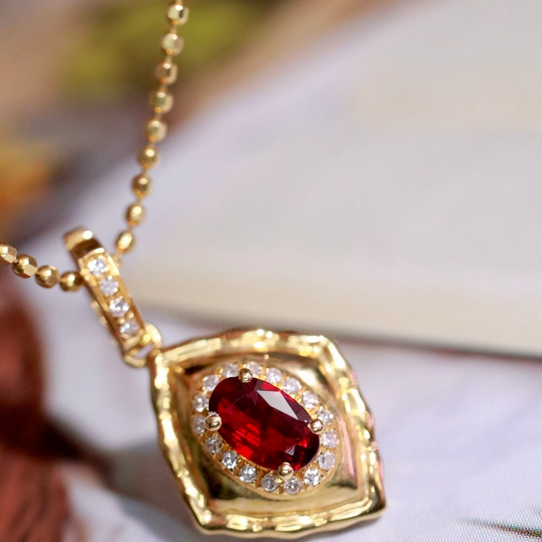 14k Gold 0.38 Ctw Natural Ruby & Diamond Pendant( Without Chain ): Ref:231132404 // gold content:14k gold // main gemstone:ruby // shape:oval // carat weight:0. 30ct // color:red // treatment:natural // // adjacent gemstone 2 : diamond // shape:round // carat