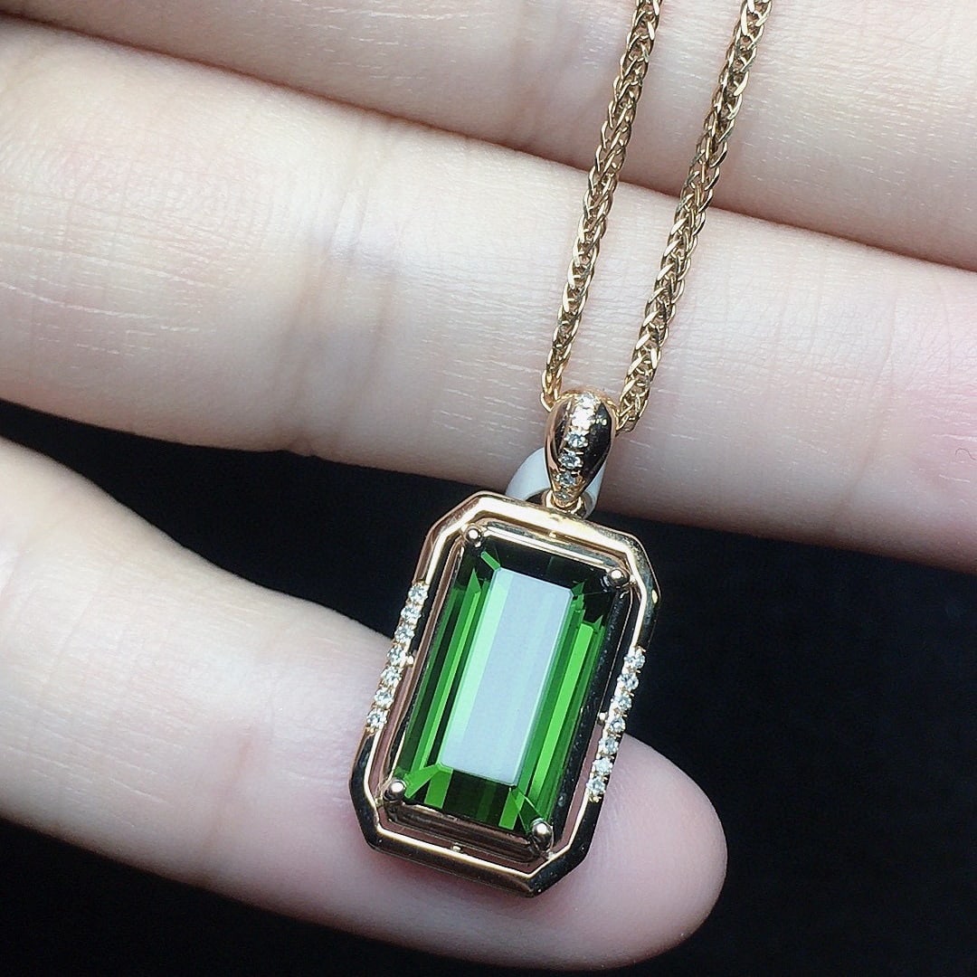 14k Gold 3.27 Ct Natural Tourmaline & Diamond Pendant( Without Chain ): Ref:231132439 // gold content:14k gold // main gemstone:tourmaline // shape:octagonal // carat weight:3. 27ct // color:green // treatment:natural // // adjacent gemstone 2 : diamond // number of stone