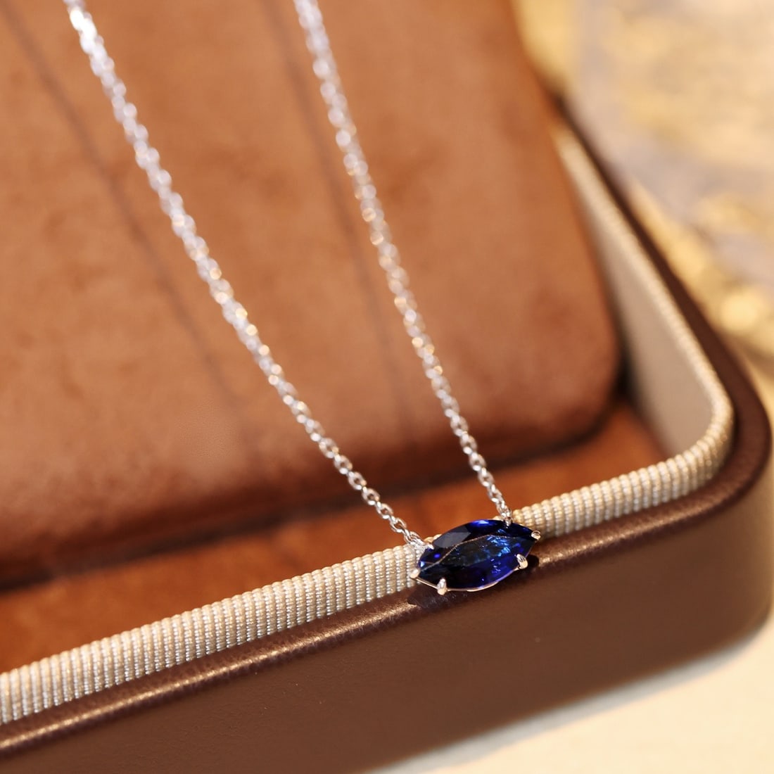 14k Gold 1.06 Ct Natural Sapphire Necklace: Ref:231132448 // gold content:14k gold // main gemstone:sapphire // shape:marquise // carat weight:1. 06ct // color:blue // treatment:natural // Condition: NewLow Estimate: 3300.00High Estimate: