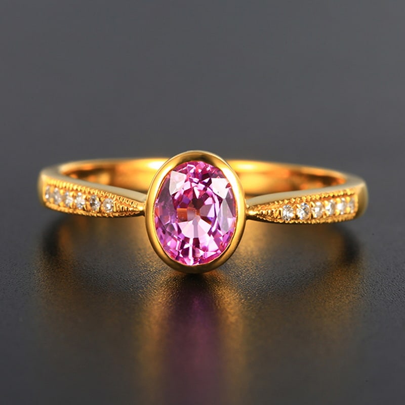 14k Gold 1 Ct Natural Padparadscha Sapphire & Diamond Ring: Ref:230999032 // gold content:14k gold // ring size:7. 25us // // main gemstone:padparadscha sapphire // shape:oval // carat weight:1ct // color:orangish pink // treatment:natural // // adjacent