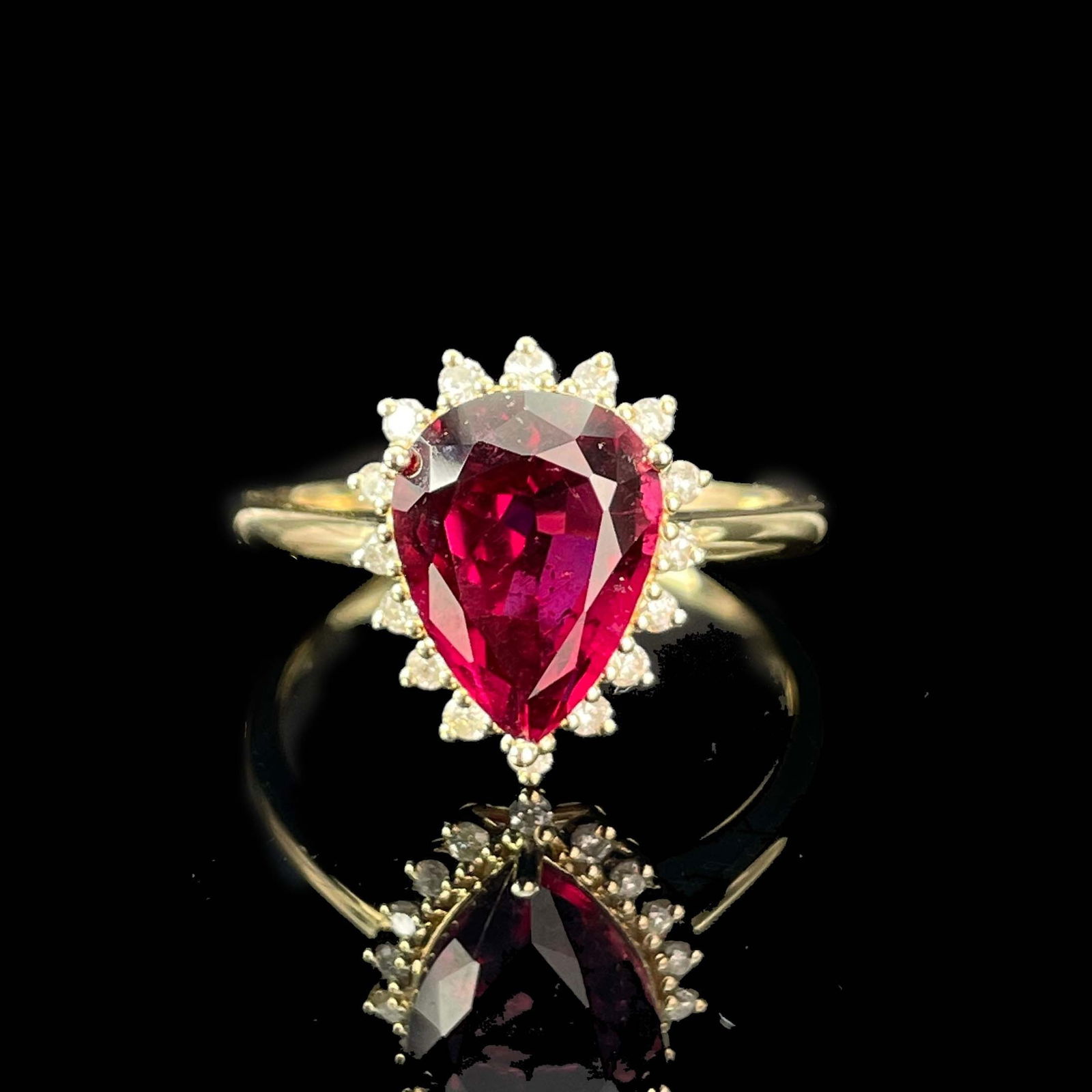 14k Gold 2.31 Ctw Natural Tourmaline & Diamond Ring: Ref:230999037 // gold content:14k gold // ring size:7. 25us // // main gemstone:tourmaline // shape:pear // carat weight:2. 15ct // color:red // treatment:natural // // adjacent gemstone 2 :