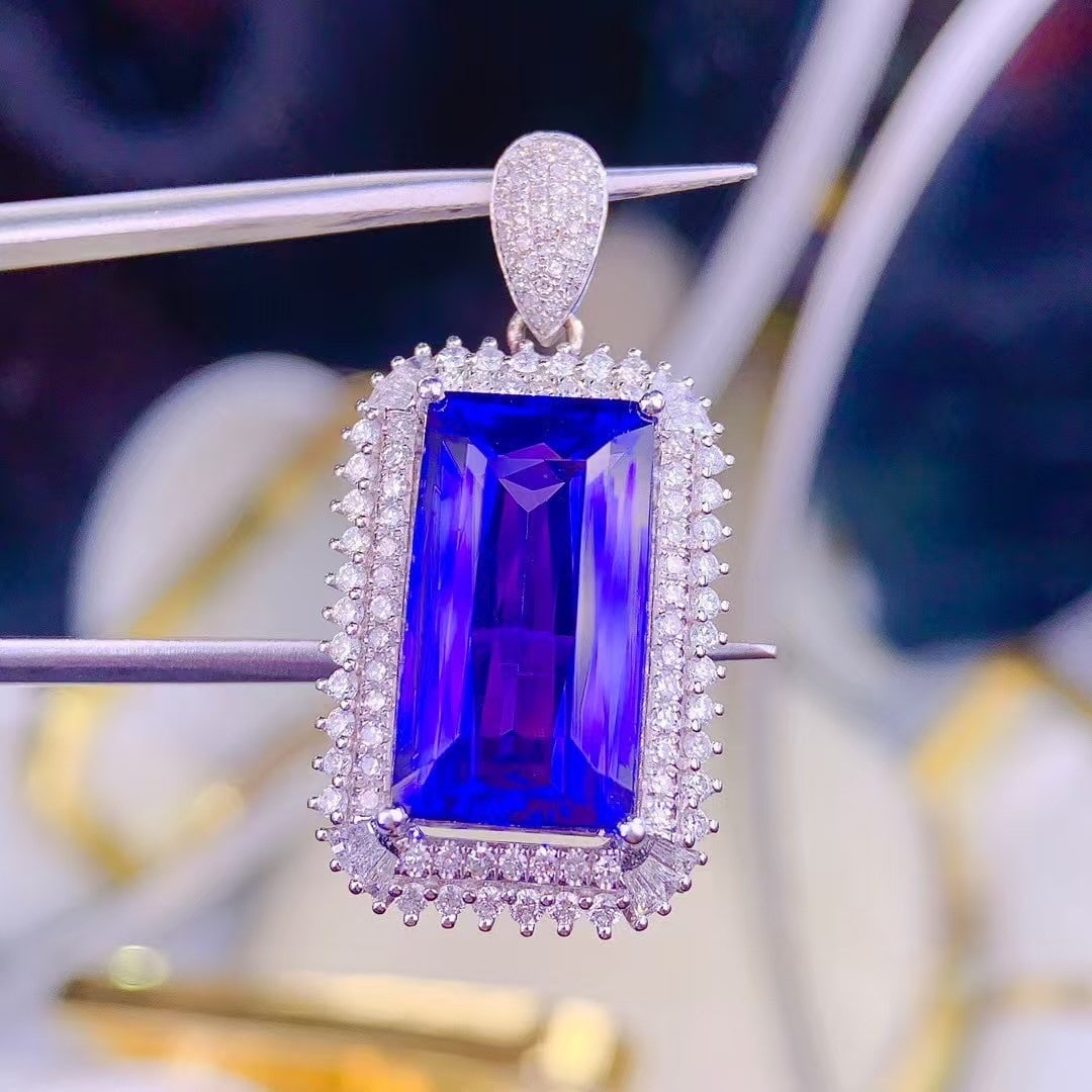 14k Gold 11 Ct Natural Tanzanite & Diamond Pendant( Without Chain ): Ref:230999050 // gold content:14k gold // main gemstone:tanzanite // shape:octagonal // carat weight:11ct // color:blue // treatment:natural // // adjacent gemstone 2 : diamond // shape:multiply //