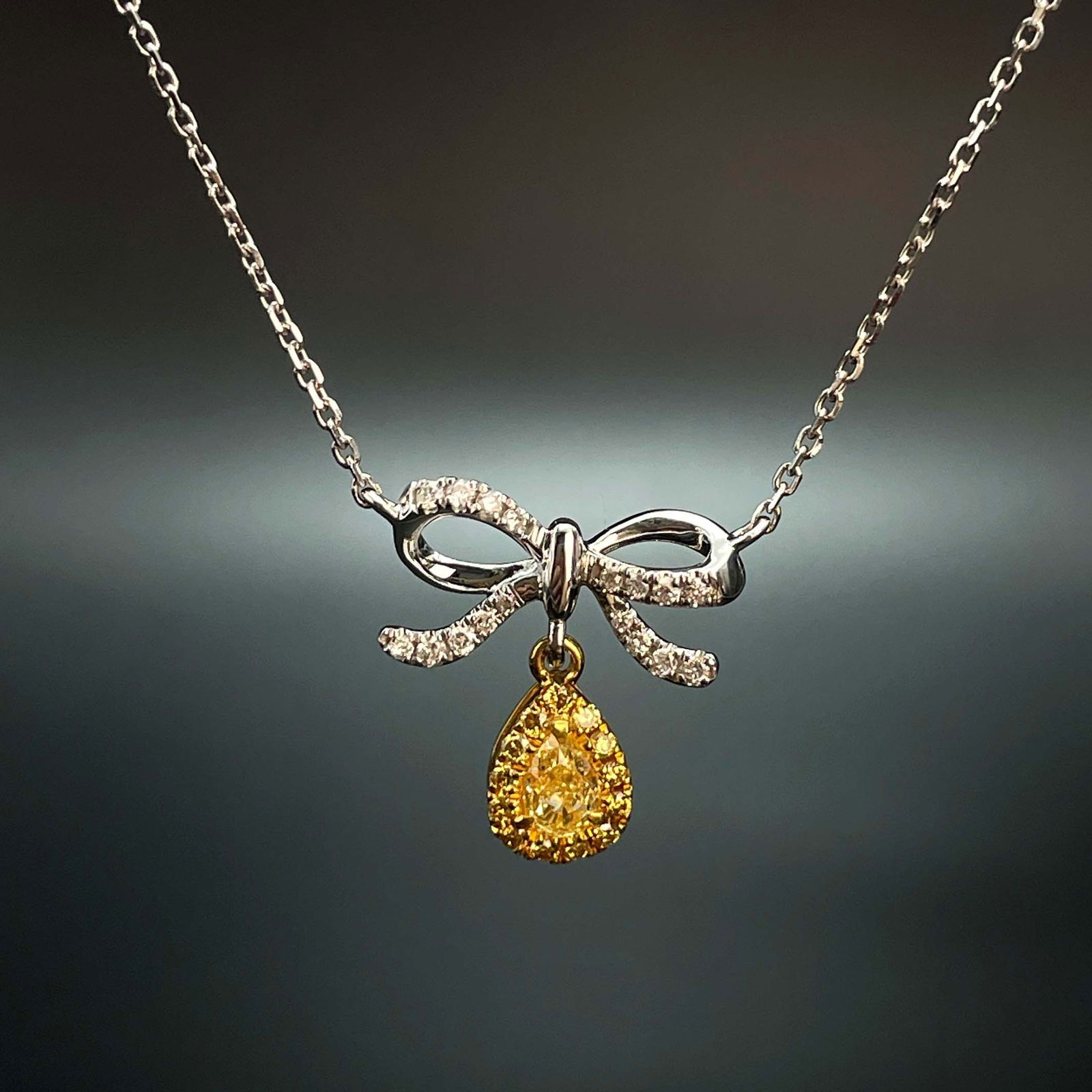 14k Gold 0.23 Ctw Natural Yellow Diamond & Diamond Necklace: Ref:230999065 // gold content:14k gold // main gemstone:yellow diamond // shape:pear // carat weight:0. 13ct // color:yellow // treatment:natural // // adjacent gemstone 2 : diamond // shape:round