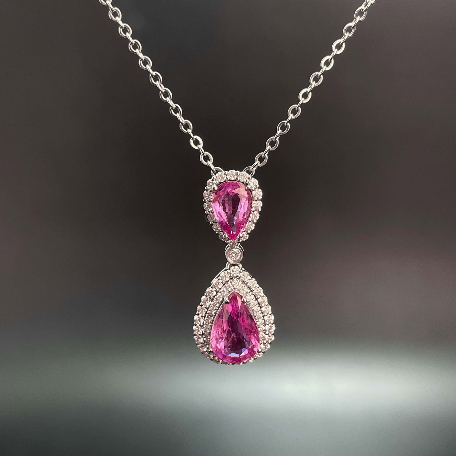 14k Gold 2.28 Ctw Natural Padparadscha Sapphire & Diamond Pendant( Without Chain ): Ref:230999082 // gold content:14k gold // main gemstone:padparadscha sapphire // shape:pear // carat weight:1. 84ct // color:orangish pink // treatment:natural // // adjacent gemstone 2 : diamond // n