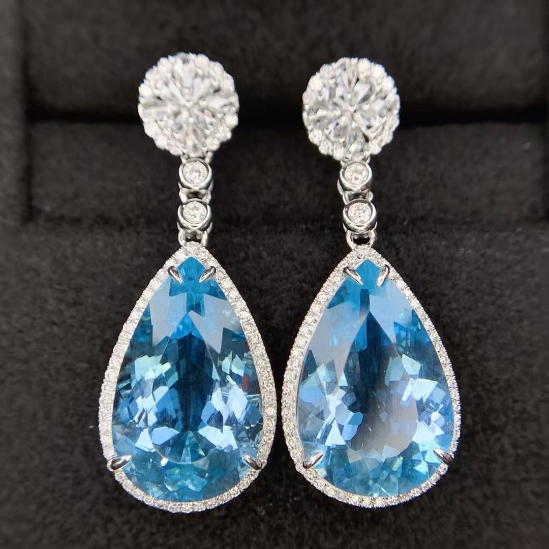 14k Gold 11.76 Ctw Natural Aquamarine & Diamond Earrings: Ref:230999102 // gold content:14k gold // main gemstone:aquamarine // shape:pear // carat weight:11. 2ct // color:blue // treatment:natural // // adjacent gemstone 2 : diamond // shape:round //