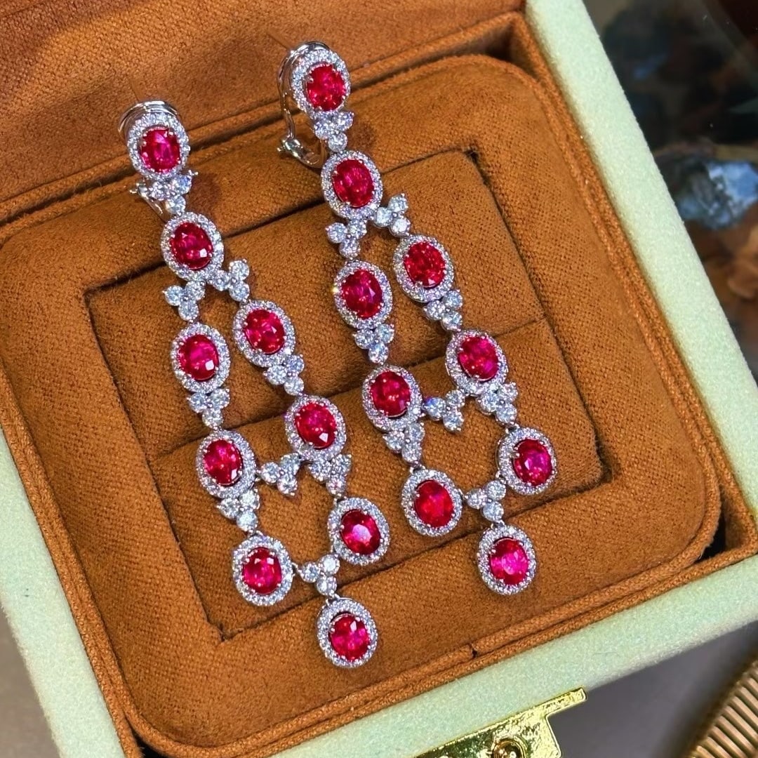 14k Gold 8.83 Ctw Natural Ruby & Diamond Earrings: Ref:230999158 // gold content:14k gold // main gemstone:ruby // shape:oval // carat weight:6. 03ct // color:red // treatment:natural // // adjacent gemstone 2 : diamond // shape:round // carat