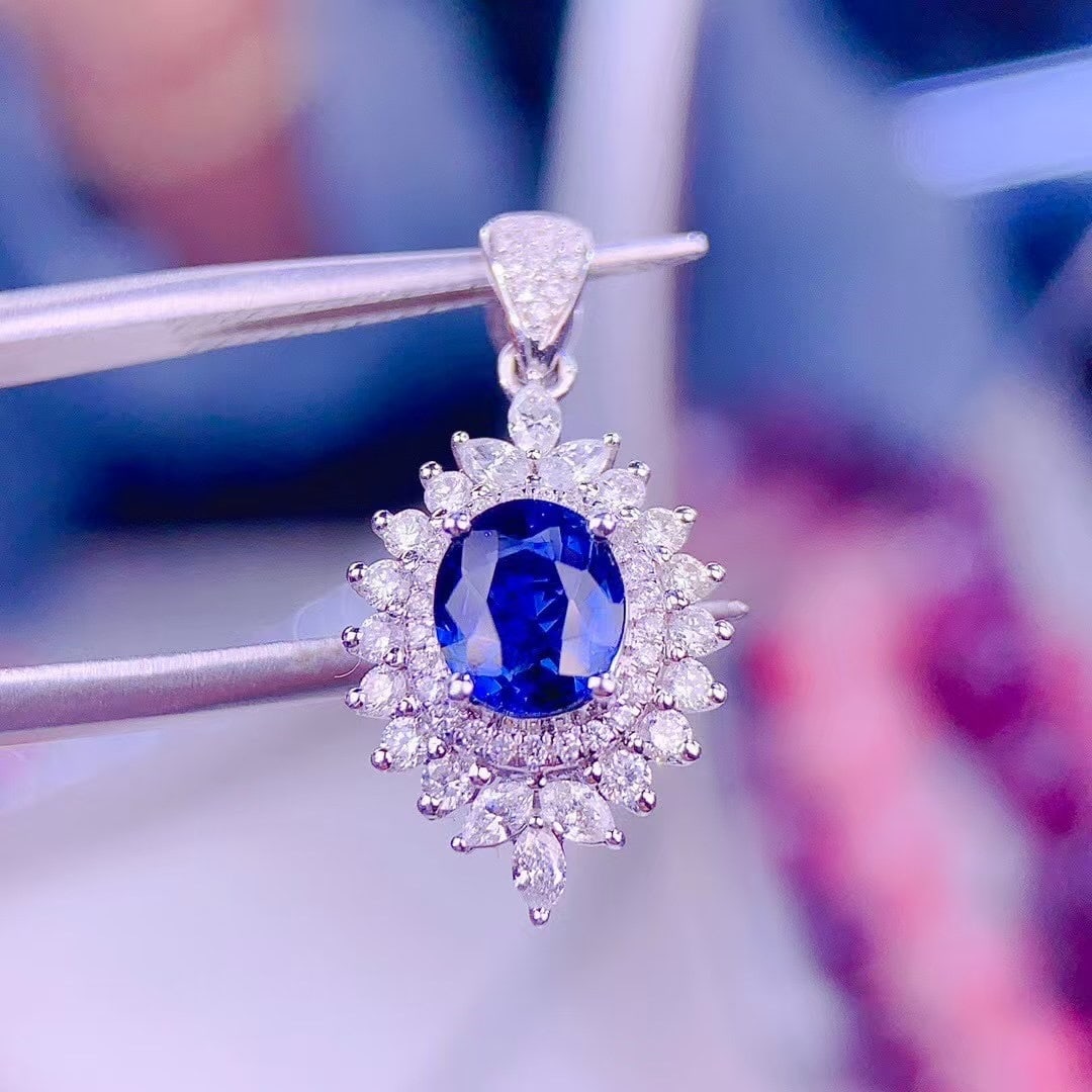 14k Gold 0.85 Ct Vivid Blue Natural Sapphire & Diamond Pendant( Without Chain ): Ref:230999184 // gold content:14k gold // main gemstone:sapphire // shape:oval // carat weight:0. 85ct // color:vivid blue // treatment:natural // // adjacent gemstone 2 : diamond // shape:multiply //