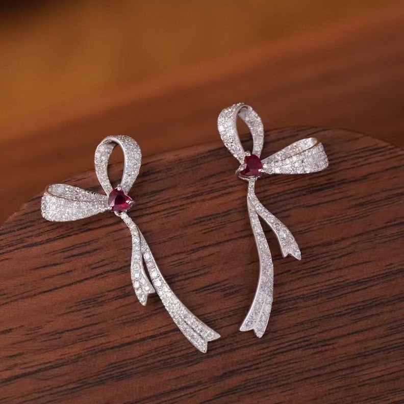 14k Gold 1.16 Ctw Natural Ruby & Diamond Earrings: Ref:230999216 // gold content:14k gold // main gemstone:ruby // shape:heart // carat weight:0. 26ct // color:red // treatment:natural // // adjacent gemstone 2 : diamond // shape:round // carat