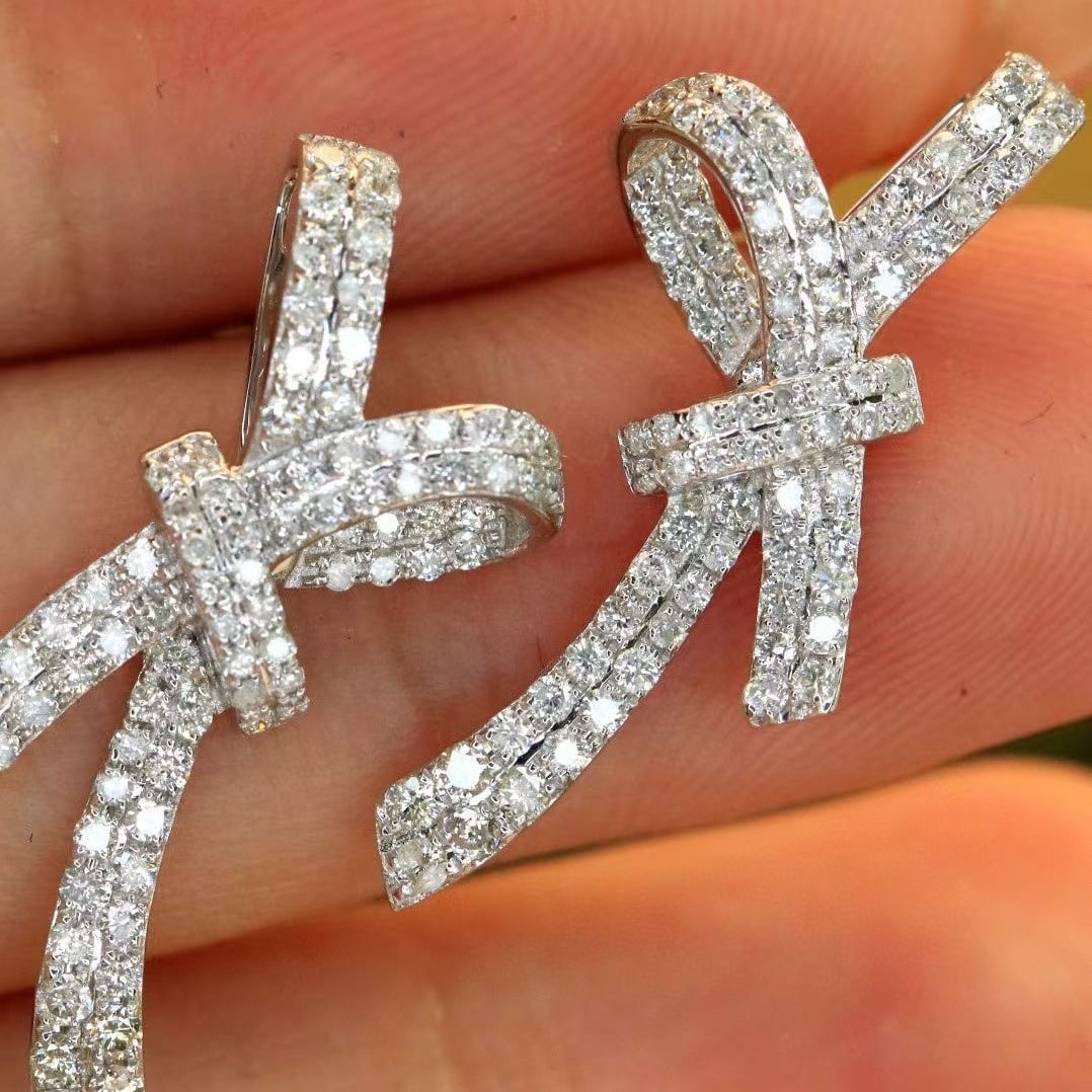 14k Gold 0.86 Ct Natural H Diamond Earrings: Ref:230999231 // gold content:14k gold // main gemstone:diamond // shape:round // carat weight:0. 86ct // clarity grade:vs-si // color:h // treatment:natural // cut grade:g // Condition: NewLow