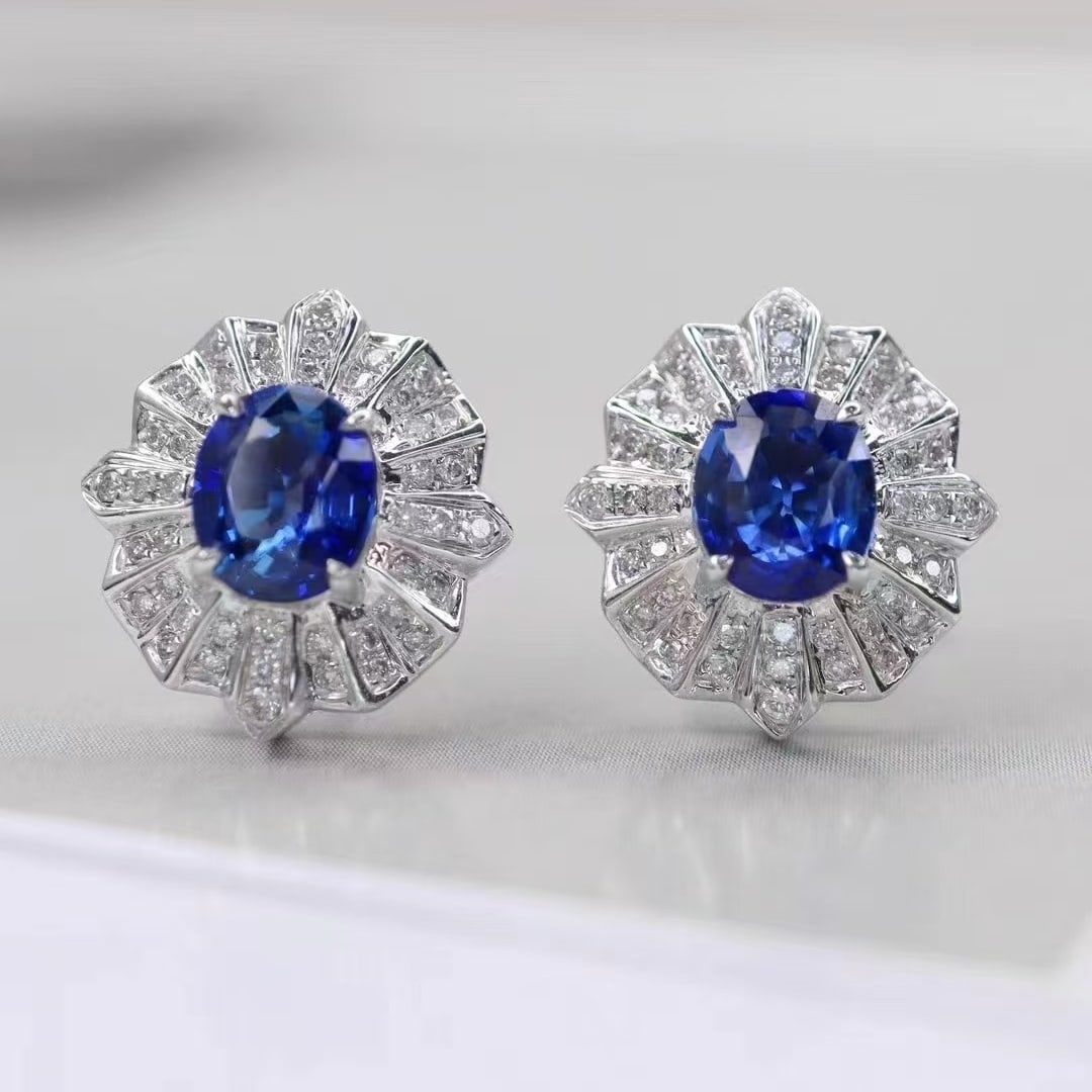 14k Gold 1.98 Ctw Natural Sapphire & Diamond Earrings: Ref:230999252 // gold content:14k gold // main gemstone:sapphire // shape:oval // carat weight:1. 7ct // color:royal blue // treatment:natural // // adjacent gemstone 2 : diamond // shape:round //