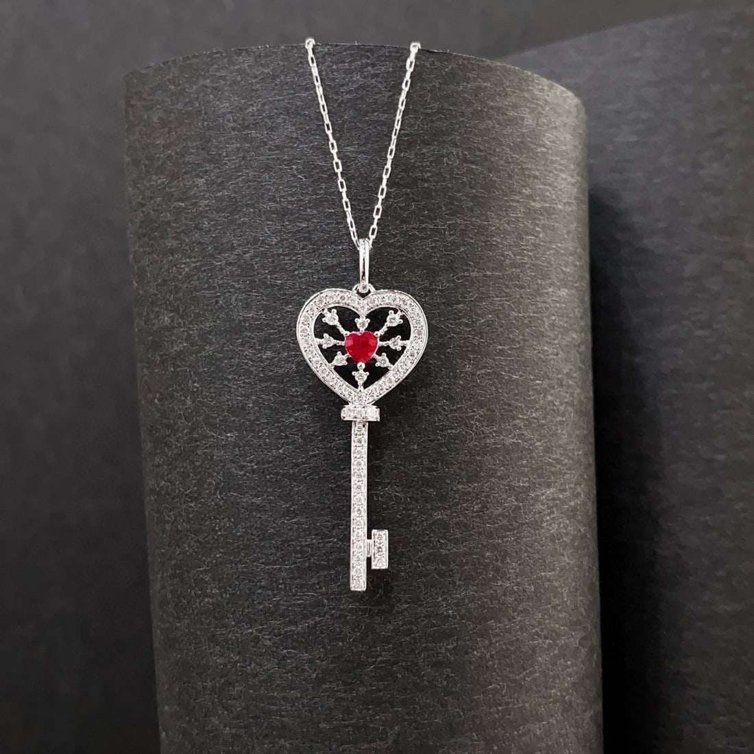 14k Gold 0.46 Ctw Natural Ruby & Diamond Pendant( Without Chain ): Ref:231000033 // gold content:14k gold // main gemstone:ruby // shape:heart // carat weight:0. 19ct // color:pigeonblood red // treatment:natural // // adjacent gemstone 2 : diamond // shape:round