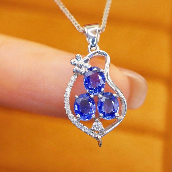 14k Gold 1.18 Ctw Natural Sapphire & Diamond Pendant( Without Chain ): Ref:231000104 // gold content:14k gold // main gemstone:sapphire // shape:oval // carat weight:1. 12ct // color:blue // treatment:natural // // adjacent gemstone 2 : diamond // number of stones:14 //